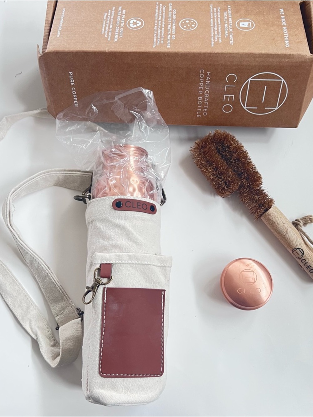 Cleo new %00 copper drinking water bottle hammered sustainable design.
